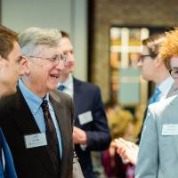 Student chatting with two donors at Scholarship Dinner 2019